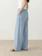 100% linen wide-leg pants with high-rise elastic waistband and side pockets