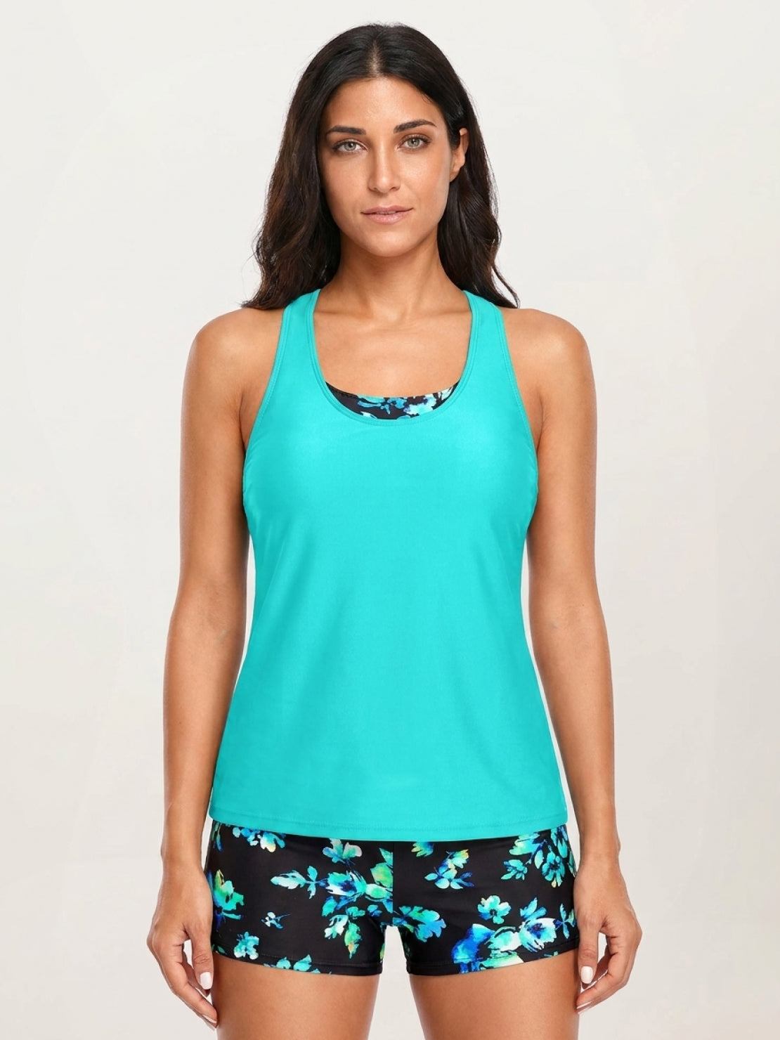 Criss-cross back three-piece tankini set with loose solid tank, printed sports bra, and boy shorts