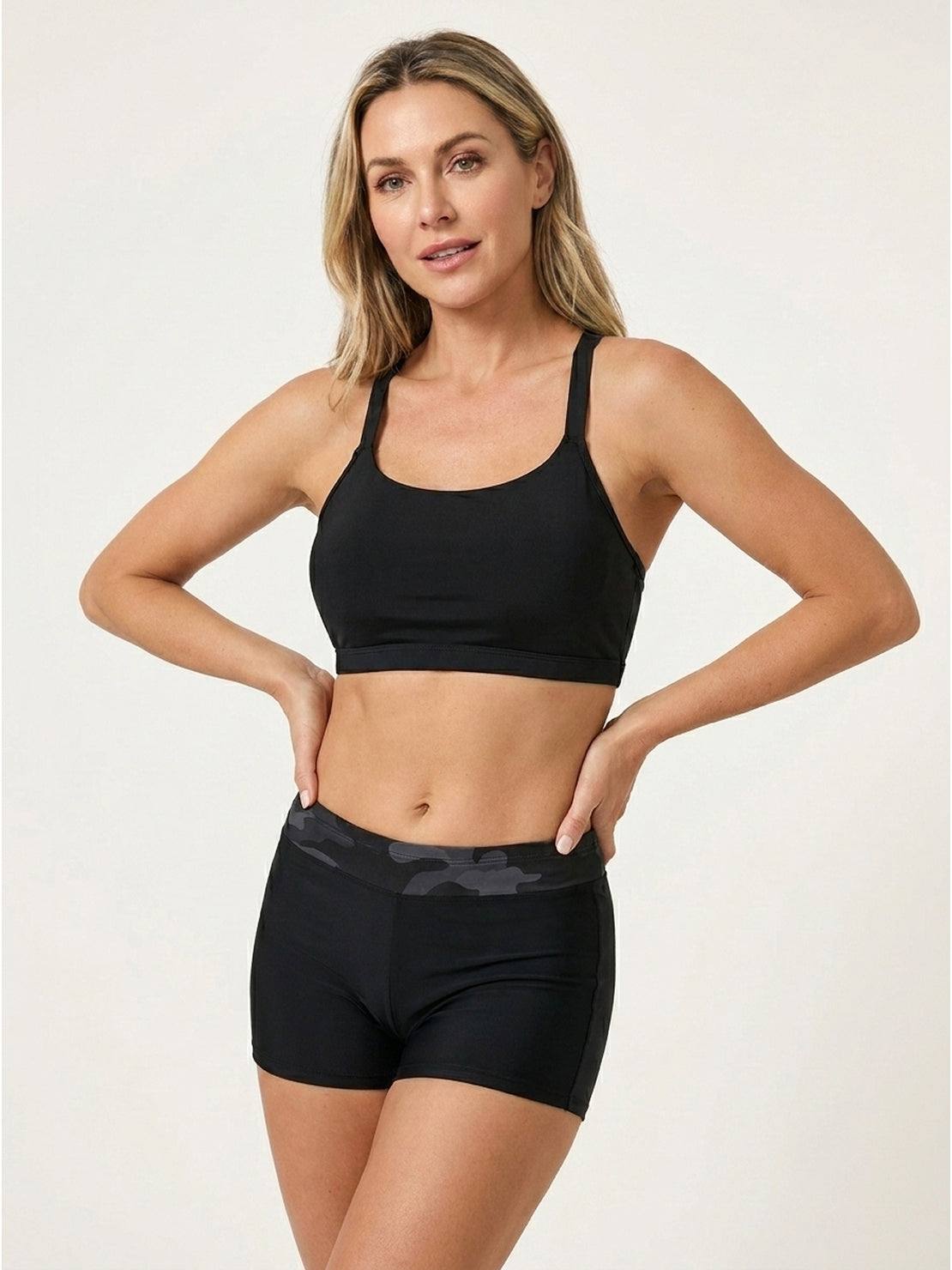 Three-piece open-back swim set with loose tank, racerback crop bra, and mid-rise boy shorts