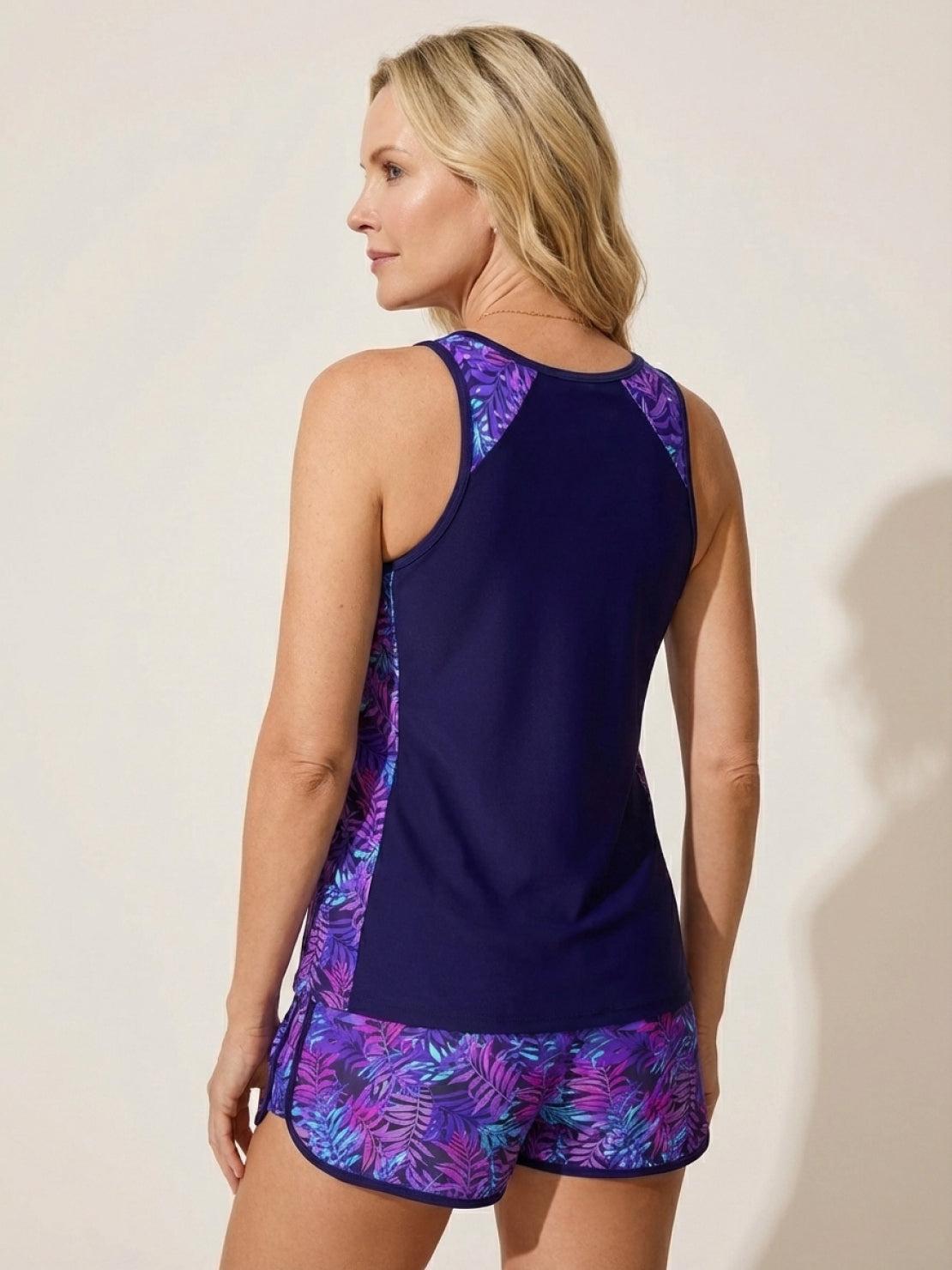 Racerback two-piece tankini set with relaxed-fit racerback tank top and tropical print swim shorts with drawstring waistband and pockets