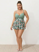 One-piece tropical crossover skirted swimwear with deep-V bodice and floral high-waist skirt