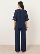 lightweight linen top with V-neck and button detail for mature women