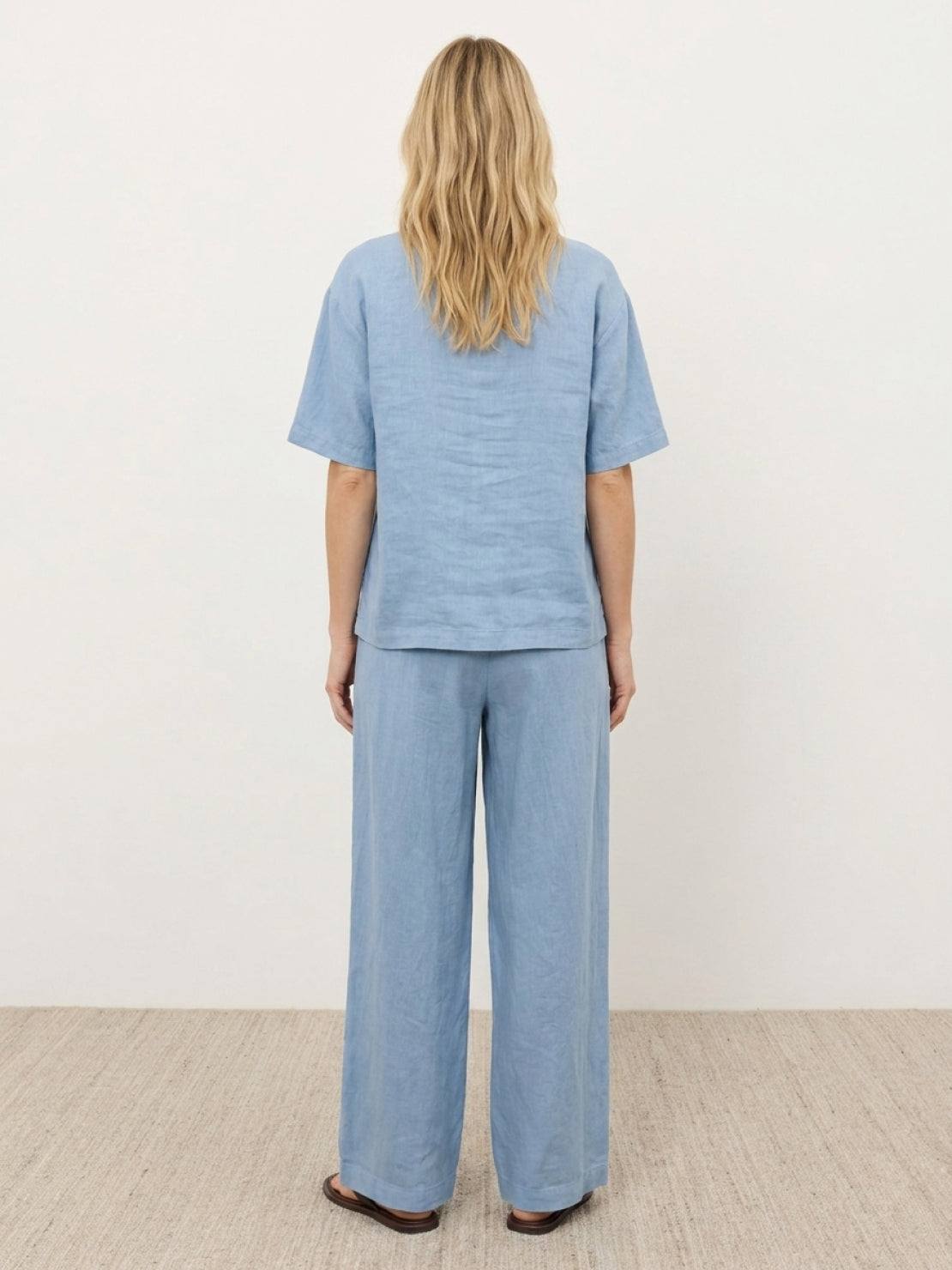 comfortable 100% cotton two-piece set with button-front top and wide-leg pants in soft solid colors