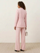Double-breasted blazer and wide-leg trousers co-ord set with gold lion-head buttons and notched lapel