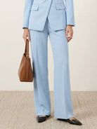 Double-breasted blazer and wide-leg trousers co-ord with gold lion-head buttons and structured tailored fit
