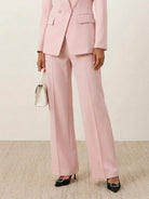 Double-breasted blazer with gold buttons and wide-leg trousers co-ord set in structured fabric