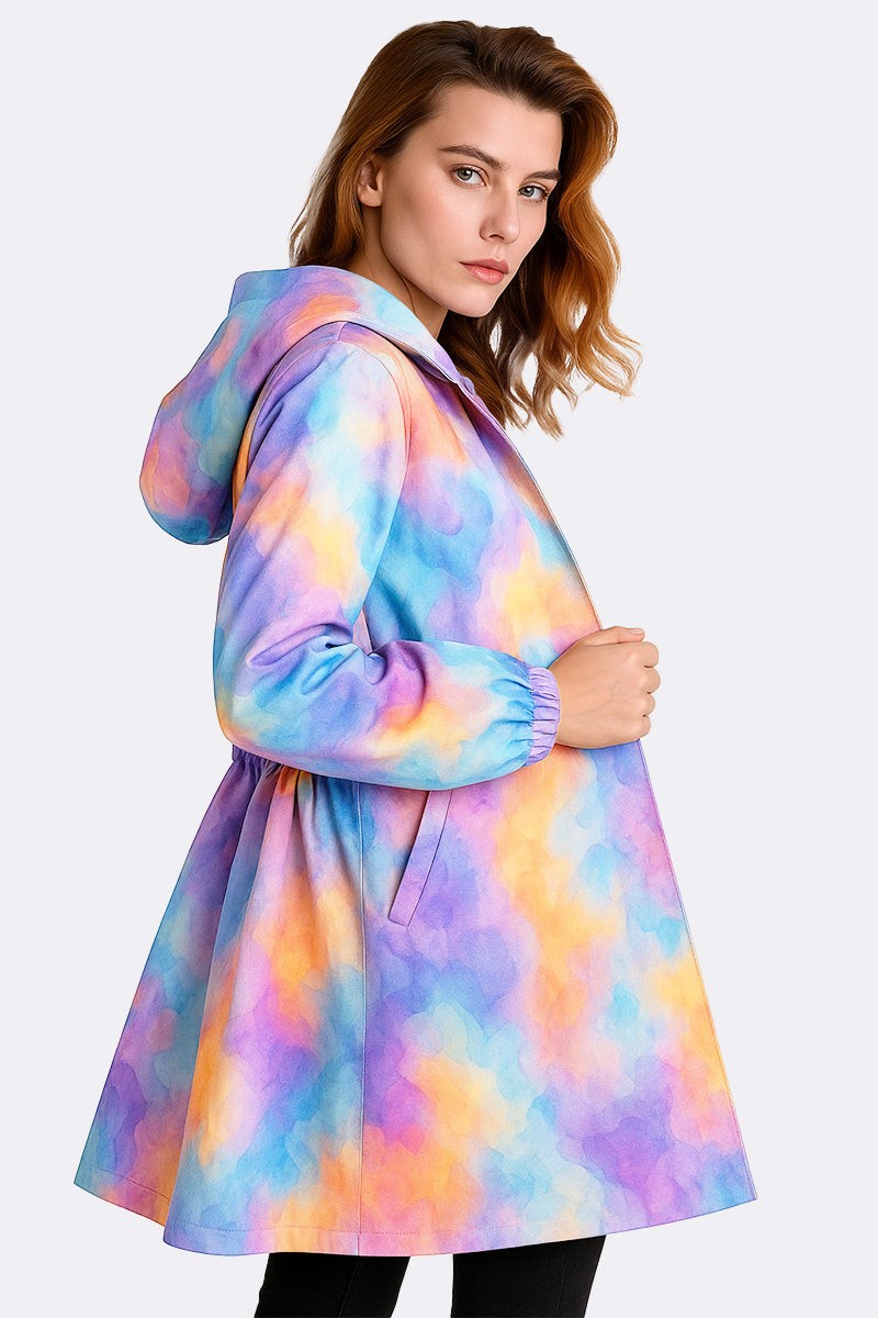 Water Resistant Oversized Windbreaker rain jacket with colorful pastel cloud pattern and hood, styled on female model.