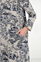 Loose fit midi dress with blue Japanese porcelain print, 3/4 sleeves, and oversized pockets.