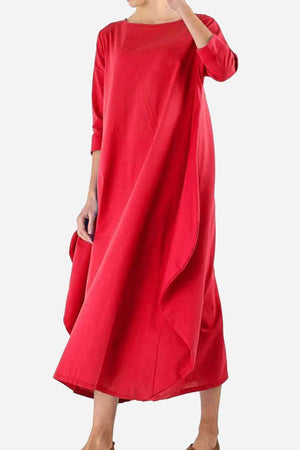 Red loose fit bohemian maxi dress with long sleeves and a floor-length hem.