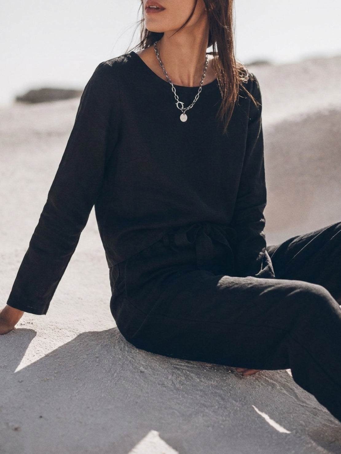 woman wearing cotton-linen monochrome relaxed longline top and wide-leg pants set