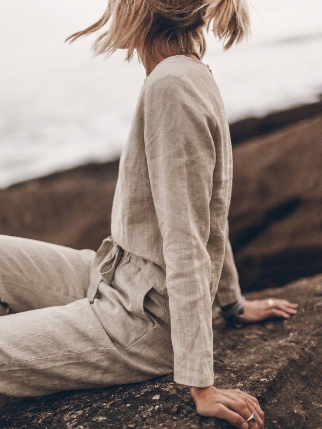 Woman wearing cotton-linen monochrome relaxed longline top and wide-leg pants set