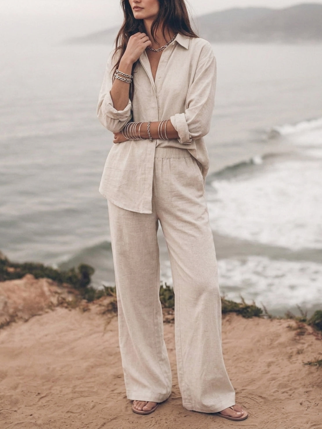Woman wearing oversized 100% cotton shirt and wide-leg pants co-ord set in a relaxed, breathable style