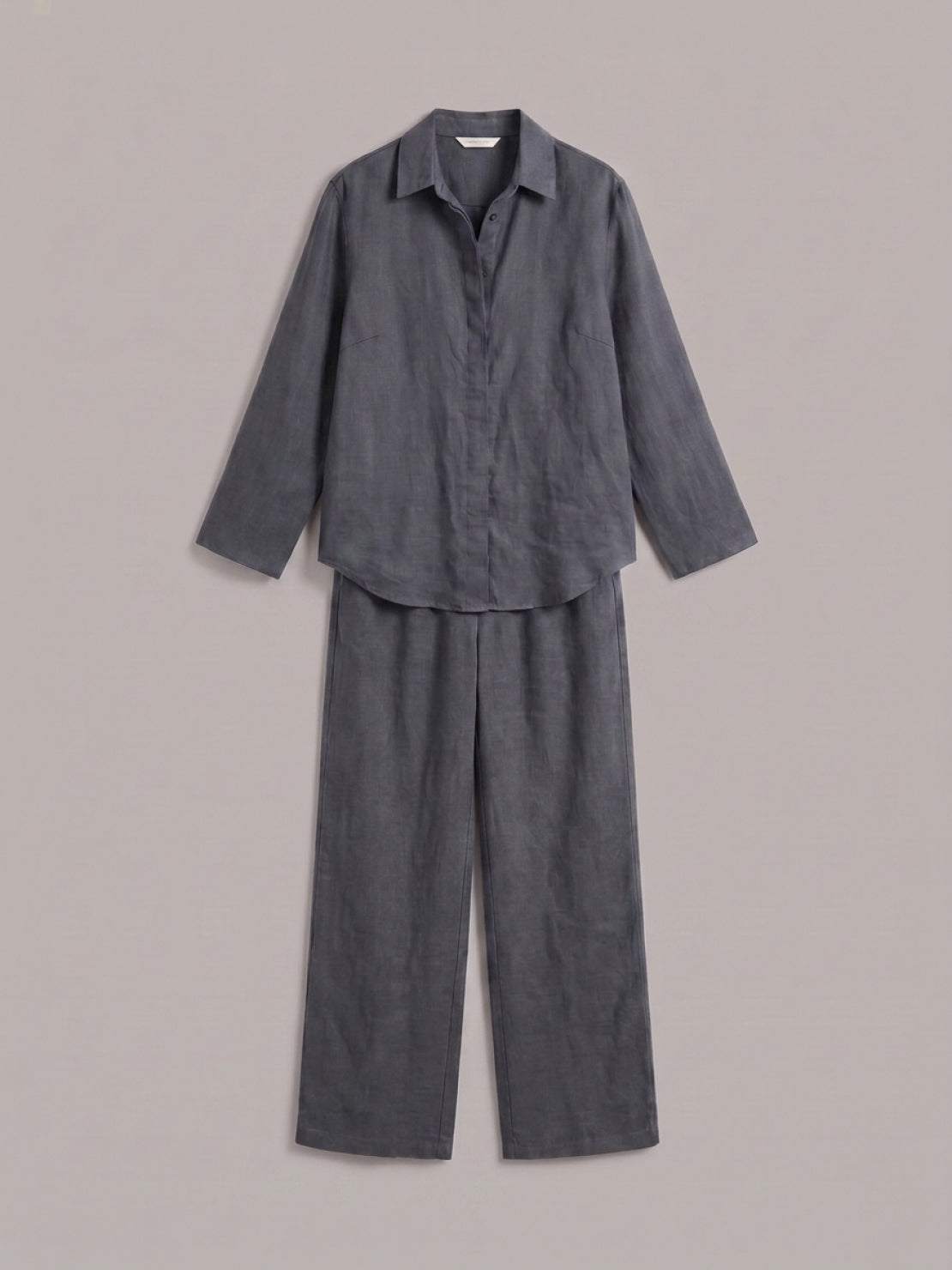 Woman wearing an oversized 100% cotton shirt with wide-leg pants co-ord set in a relaxed, breathable style