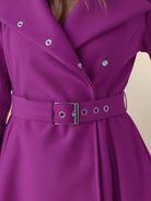 Water-repellent A-line hooded raincoat with matching belt and insulated lining for women