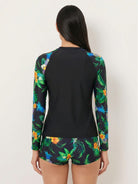 Women’s swim shorts rash guard set with long raglan sleeves and printed boyshort bottoms