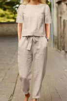 Cotton-linen blend monochrome two-piece set laid flat on white background