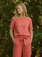 Model wearing relaxed 100% cotton linen set in monochrome tones with breathable soft fabric