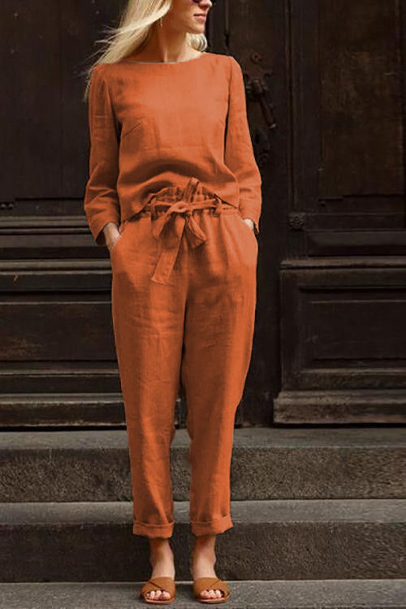 Cotton-linen monochrome relaxed longline top and wide-leg pants set in rust color.