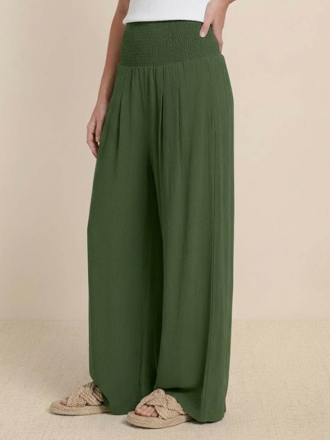 Green high-waist cotton linen palazzo pants with wide legs and smocked waistband for comfort and style