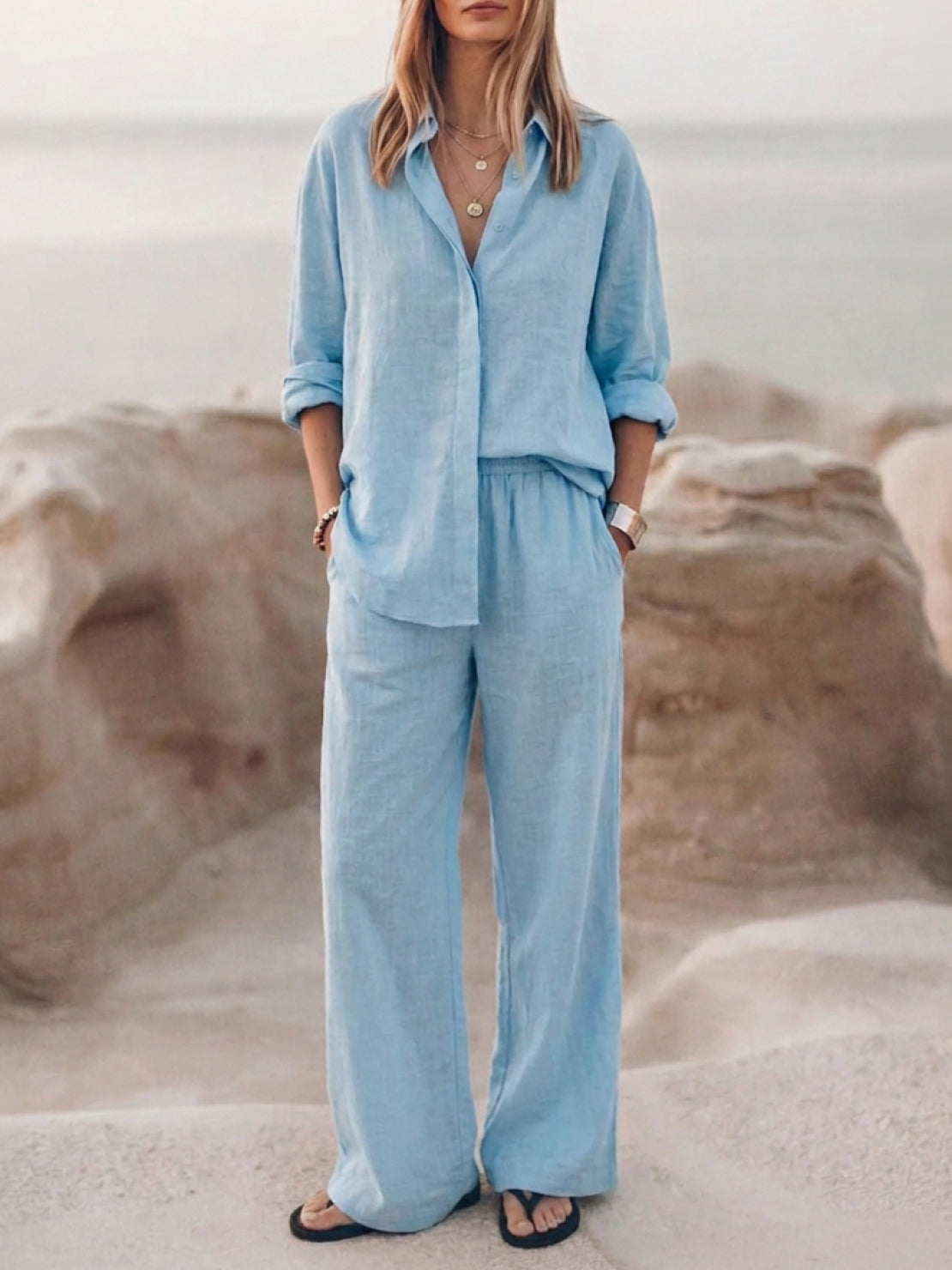 Model wearing oversized 100% cotton shirt and wide-leg pants co-ord set in relaxed style