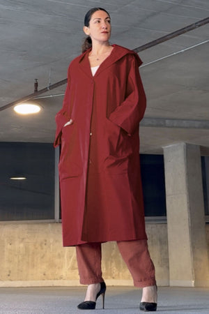 Water-resistant oversized windbreaker jacket with hood and large pockets in a relaxed fit