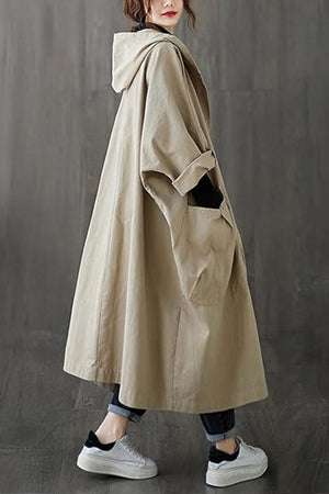 Oversized water-resistant windbreaker jacket with waterproof design and attached hood for all-season wear
