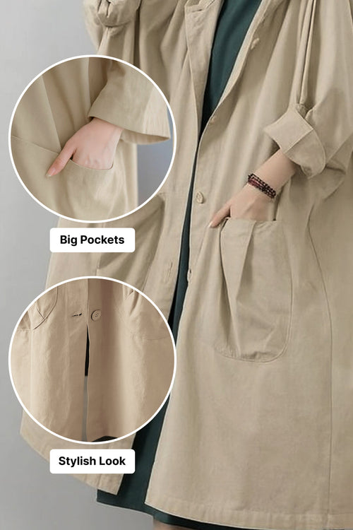 Oversized water-resistant windbreaker jacket with waterproof design, large pockets, attached hood, and snap-button closure