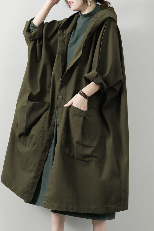 Oversized one-size water-resistant windbreaker jacket with hood and large front pockets featuring waterproof design