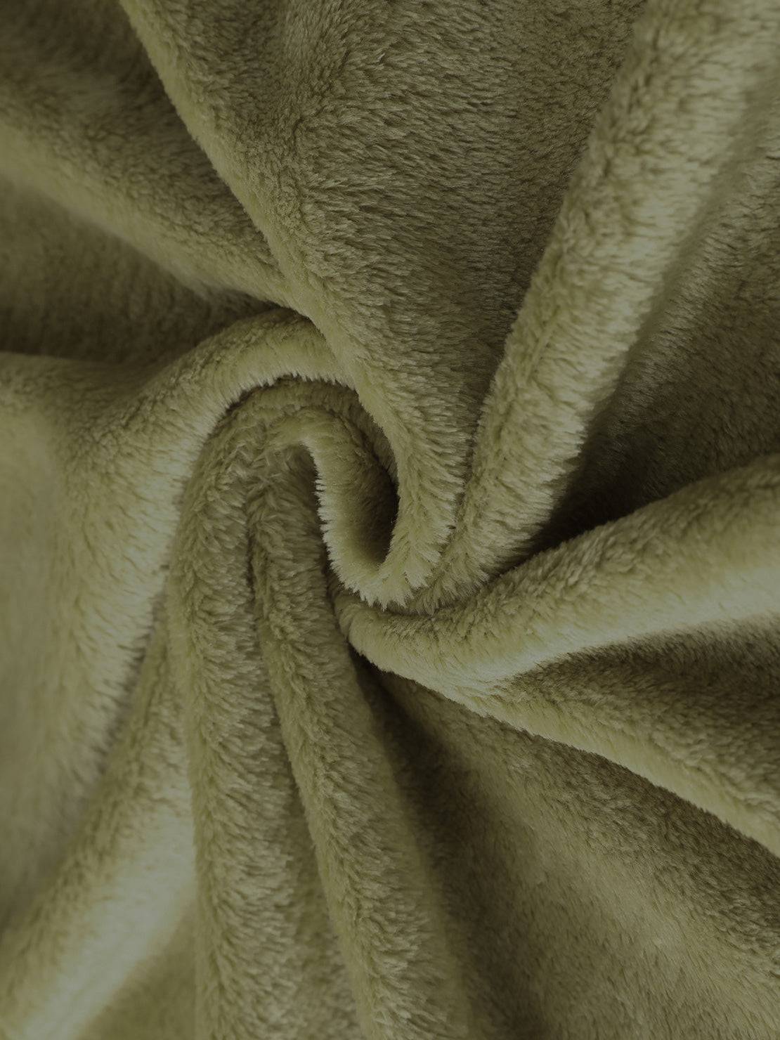 Close-up of soft plush faux fur fabric in light olive green for open front oversized fur jacket