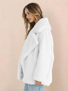 Women wearing white open front oversized faux fur jacket with draped shawl collar and mid-hip length