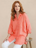 Oversized linen shirt in breathable cotton-linen blend with relaxed fit and button-back detail