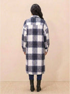 Oversized medium-length blue plaid wool-blend overshirt jacket with functional pockets and relaxed fit