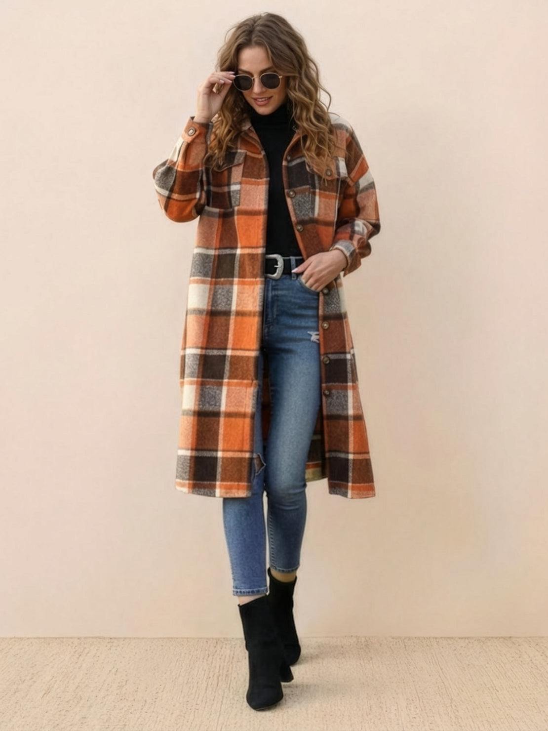 Oversized medium-length blue plaid overshirt jacket with relaxed fit and functional pockets