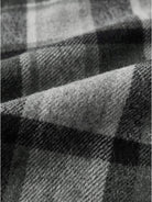 Oversized medium-length blue plaid wool-blend overshirt with functional pockets and relaxed fit