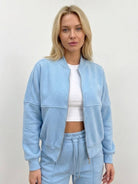 The Voyager Zip Set two-piece zip-front sweatshirt and wide-leg joggers matching travel outfit