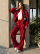 The Voyager Zip Set two-piece zip-front sweatshirt and wide-leg joggers in neutral tones for stylish travel comfort