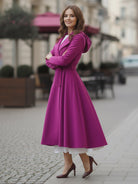 Water-repellent A-line hooded raincoat with feminine fit and insulated lining for warmth and style