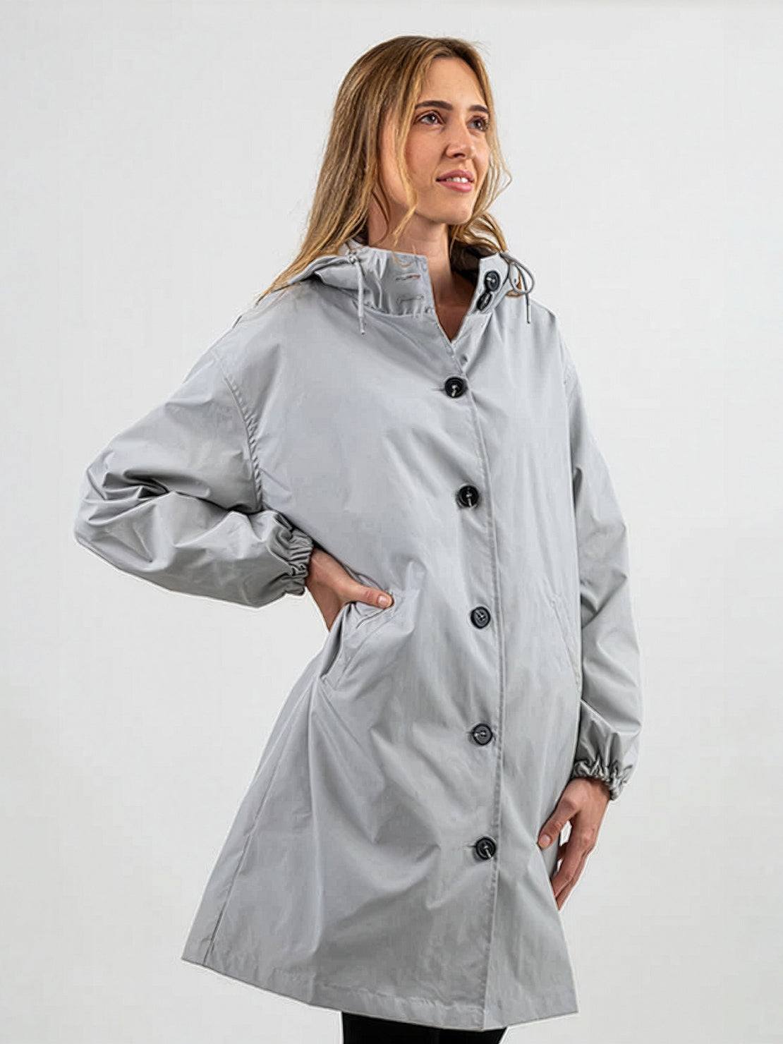Water-resistant oversized hooded windbreaker rain jacket in high-quality polyester for outdoor protection and style