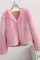 Pink bold faux fur jacket with V neckline and button front closure on hanger